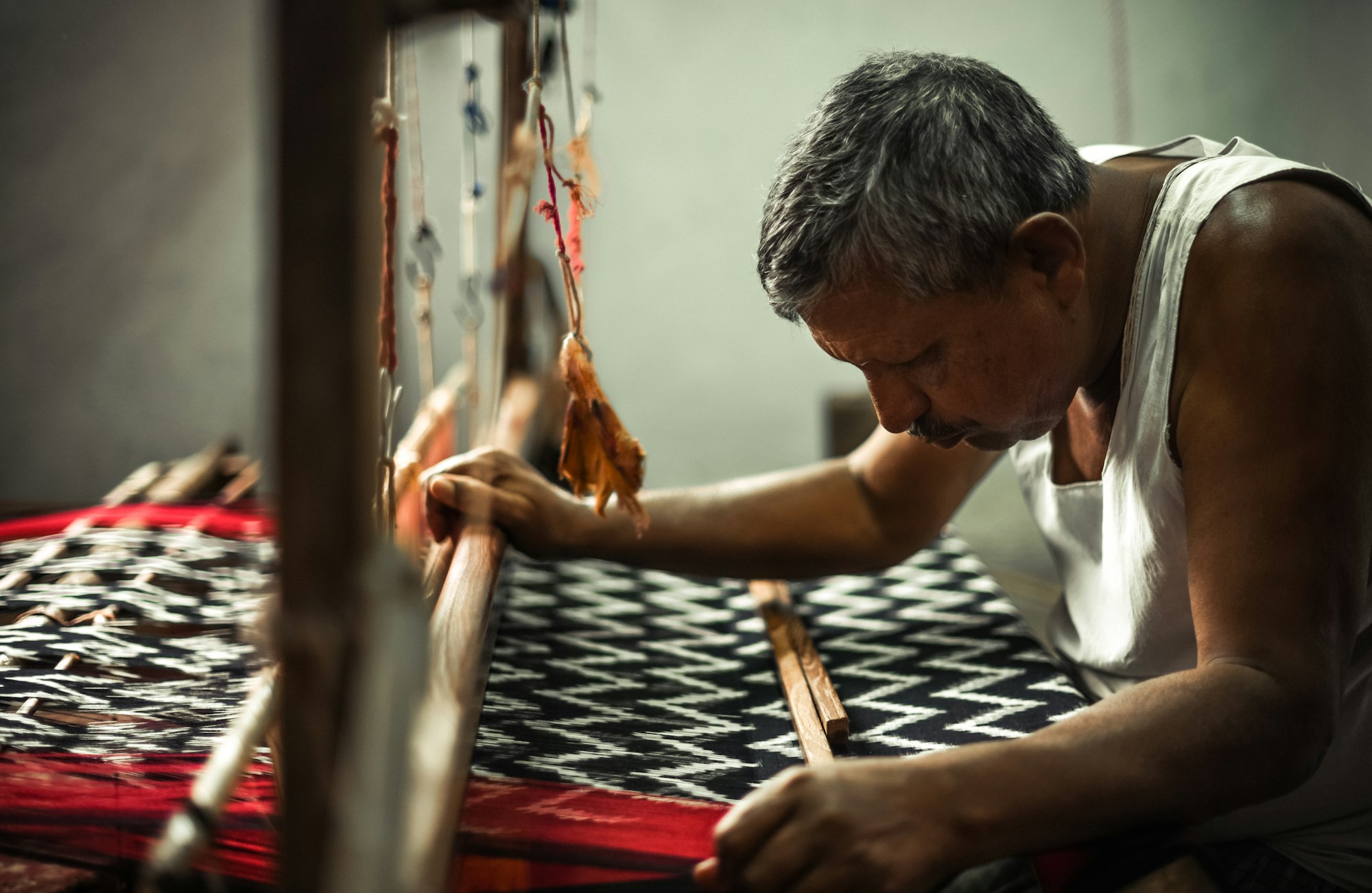 An Indian handloom weaver at work — Pochampally ikat in progress